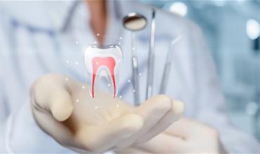 مقایسه درمان کانال ریشه دندان در یک جلسه یا چند جلسه‌ای
